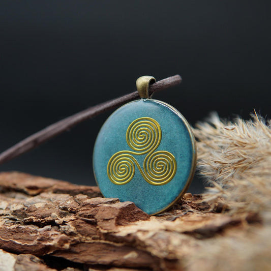 Triskele Orgonite Amulet – Celtic Talisman in Turquoise – Sacred Geometry Jewelry