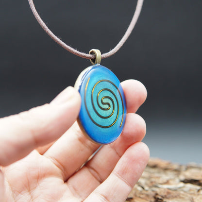 Kosmische Spirale Orgonit – Halschakra (Vishuddha) Amulett für Intuition & Schutz
